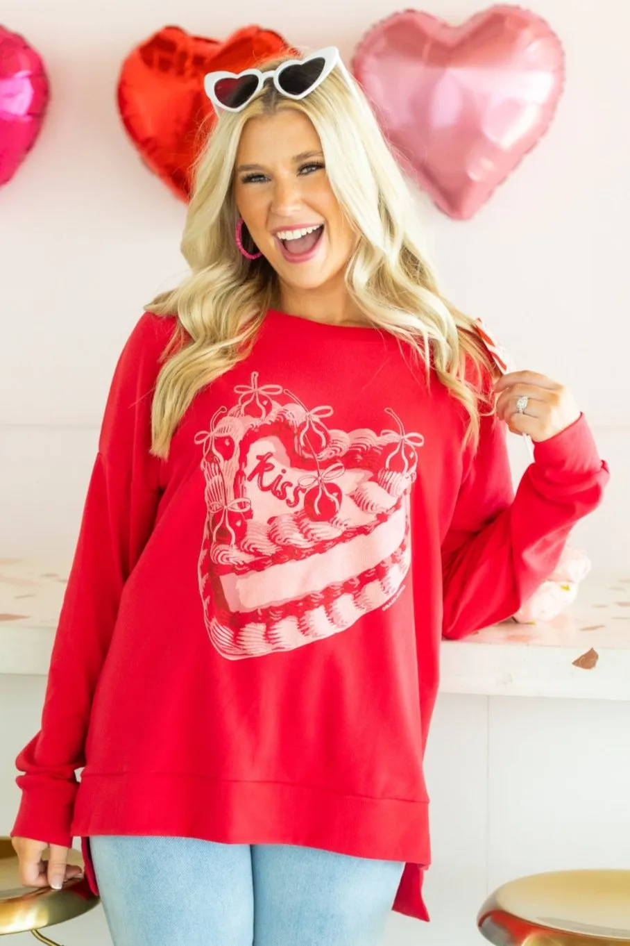 Kiss Cake on Red Sweatshirt