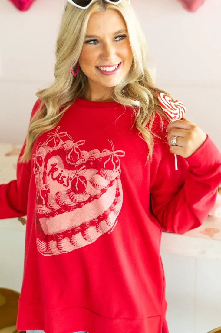 Kiss Cake on Red Sweatshirt